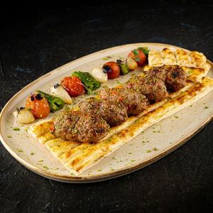 Pan-Seared Lamb Koftas with Tzatziki Sauce and Grilled Pita Bread